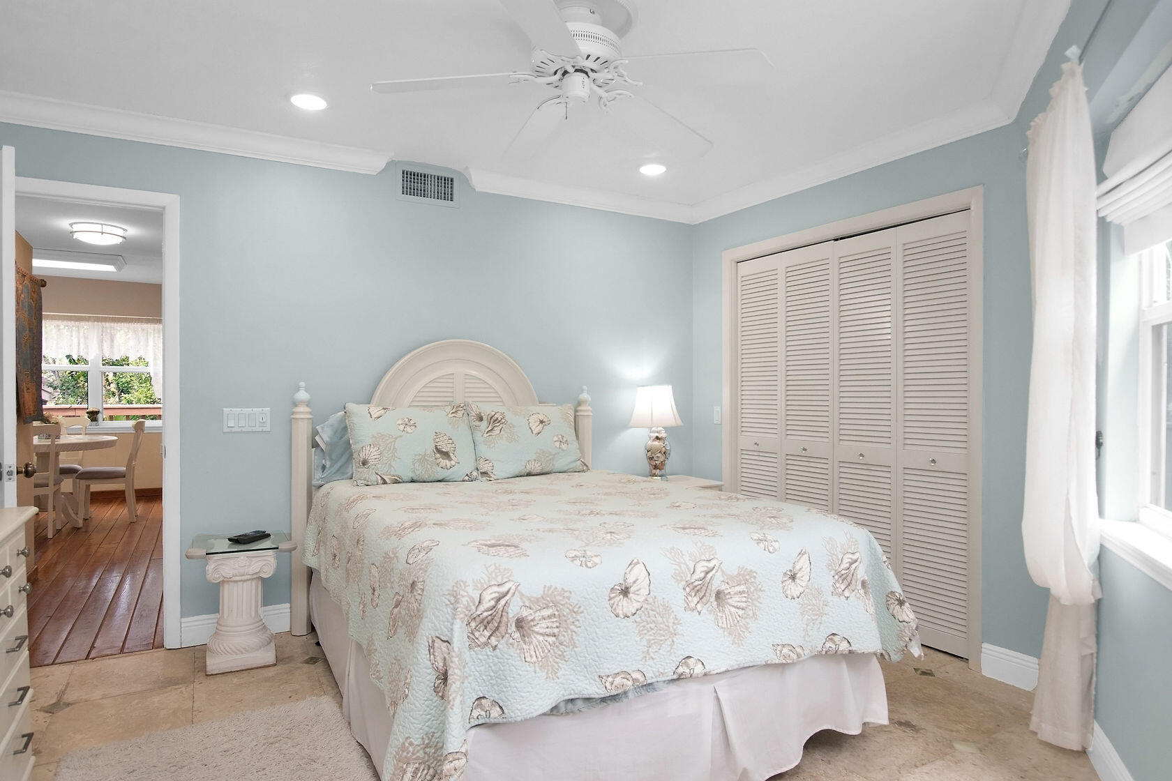 676 Sailfish Trail Key Largo, FL 33037 - Photo 16 of 38 a bedroom with a bed and a window