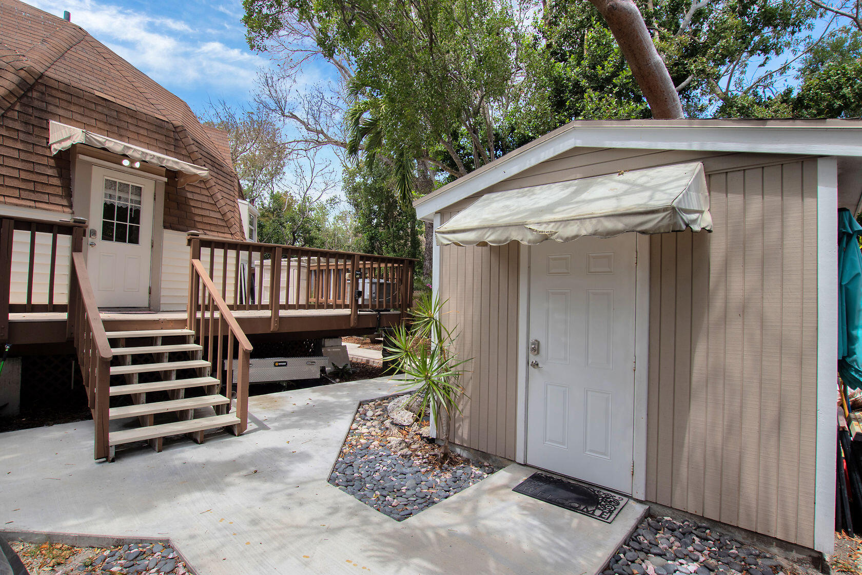 676 Sailfish Trail Key Largo, FL 33037 - Photo 23 of 38 a view of outdoor space with wooden floor and stairs
