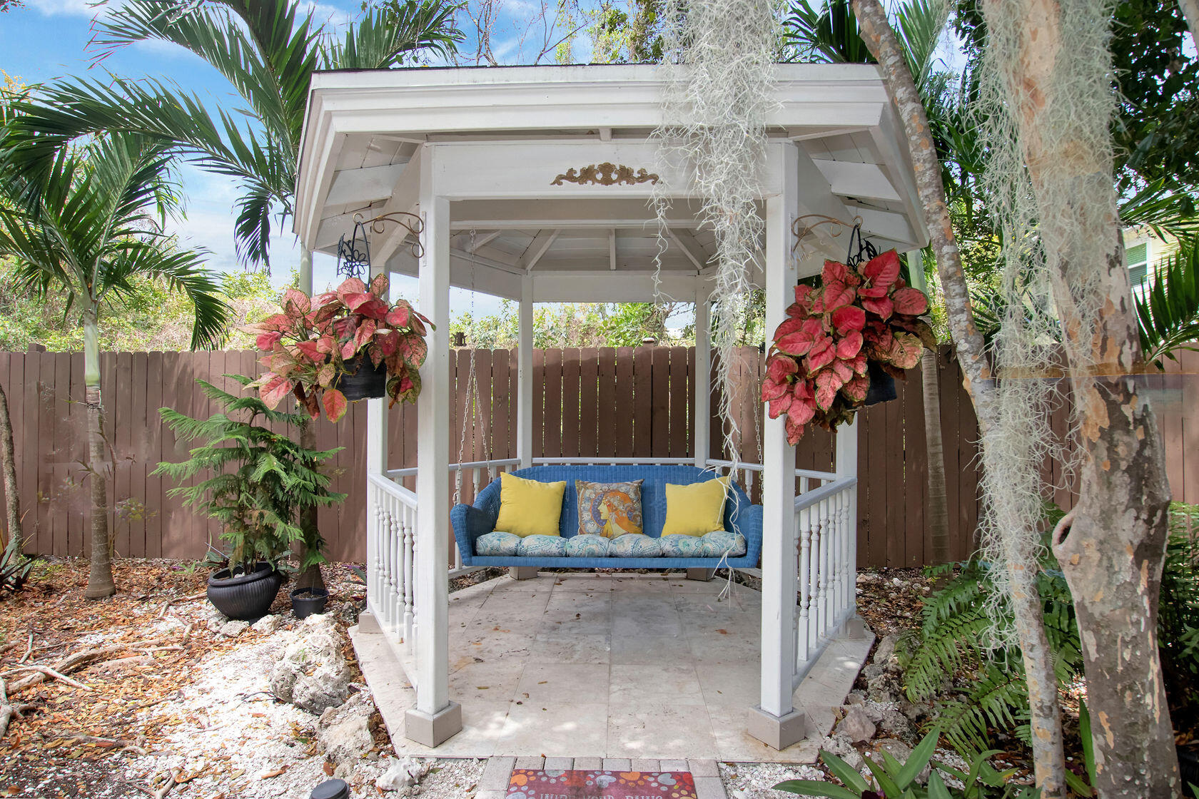 676 Sailfish Trail Key Largo, FL 33037 - Photo 25 of 38 a front view of a house with a yard