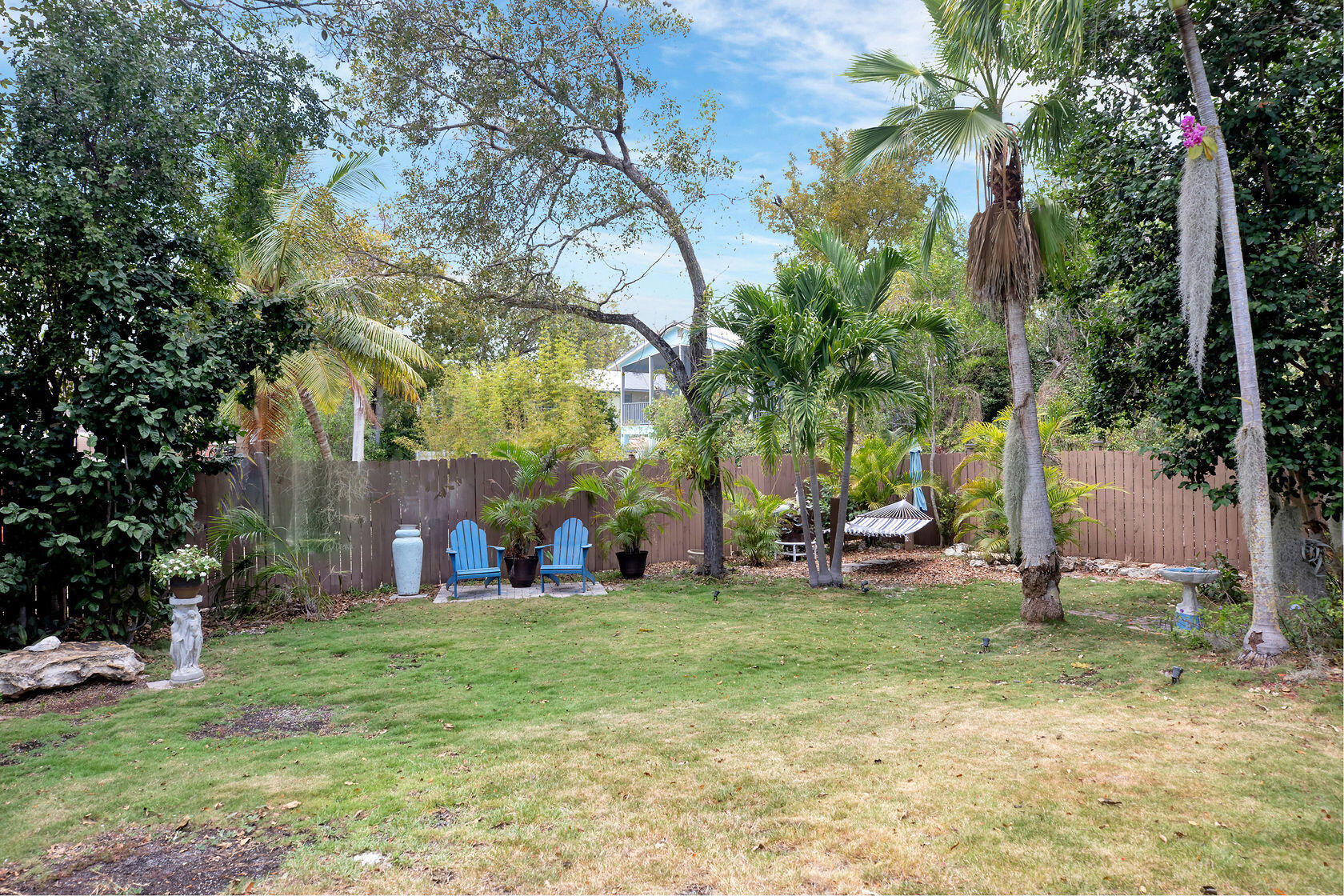 676 Sailfish Trail Key Largo, FL 33037 - Photo 30 of 38 a view of a trees in front of a house