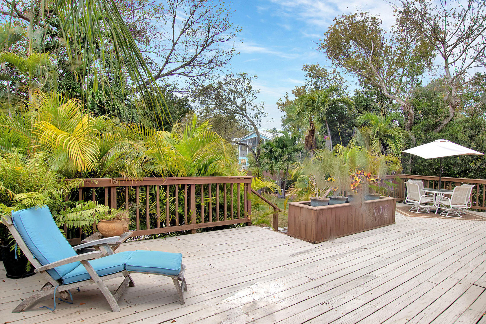 676 Sailfish Trail Key Largo, FL 33037 - Photo 5 of 38 a view of a chair and tables in the patio