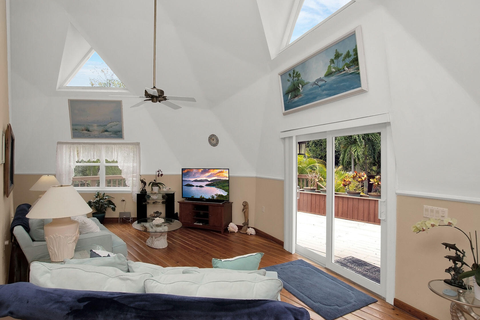 676 Sailfish Trail Key Largo, FL 33037 - Photo 7 of 38 a living room with furniture and a fireplace