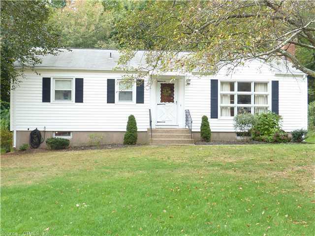 82 Corbin Road Hamden, CT 06517 - Photo 1 of 1 a view of a house with a backyard