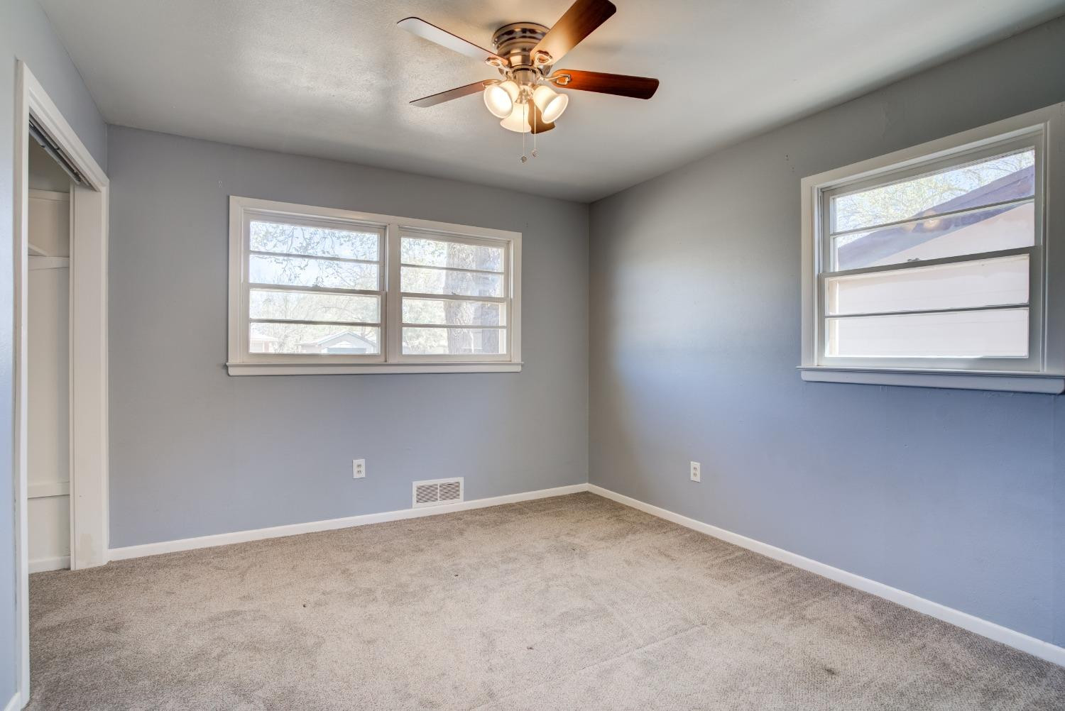 3011 44th Street Lubbock, TX 79413 - Photo 14 of 19 a view of an empty room with a window