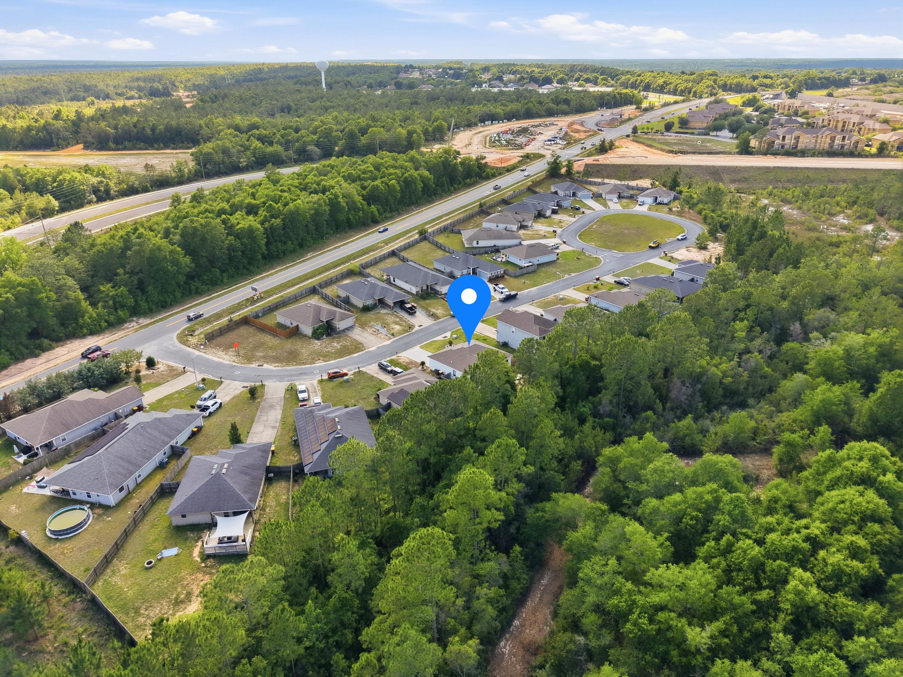 120 Lillian Way Crestview, FL 32536 - Photo 14 of 67 an aerial view of residential houses with outdoor space and river