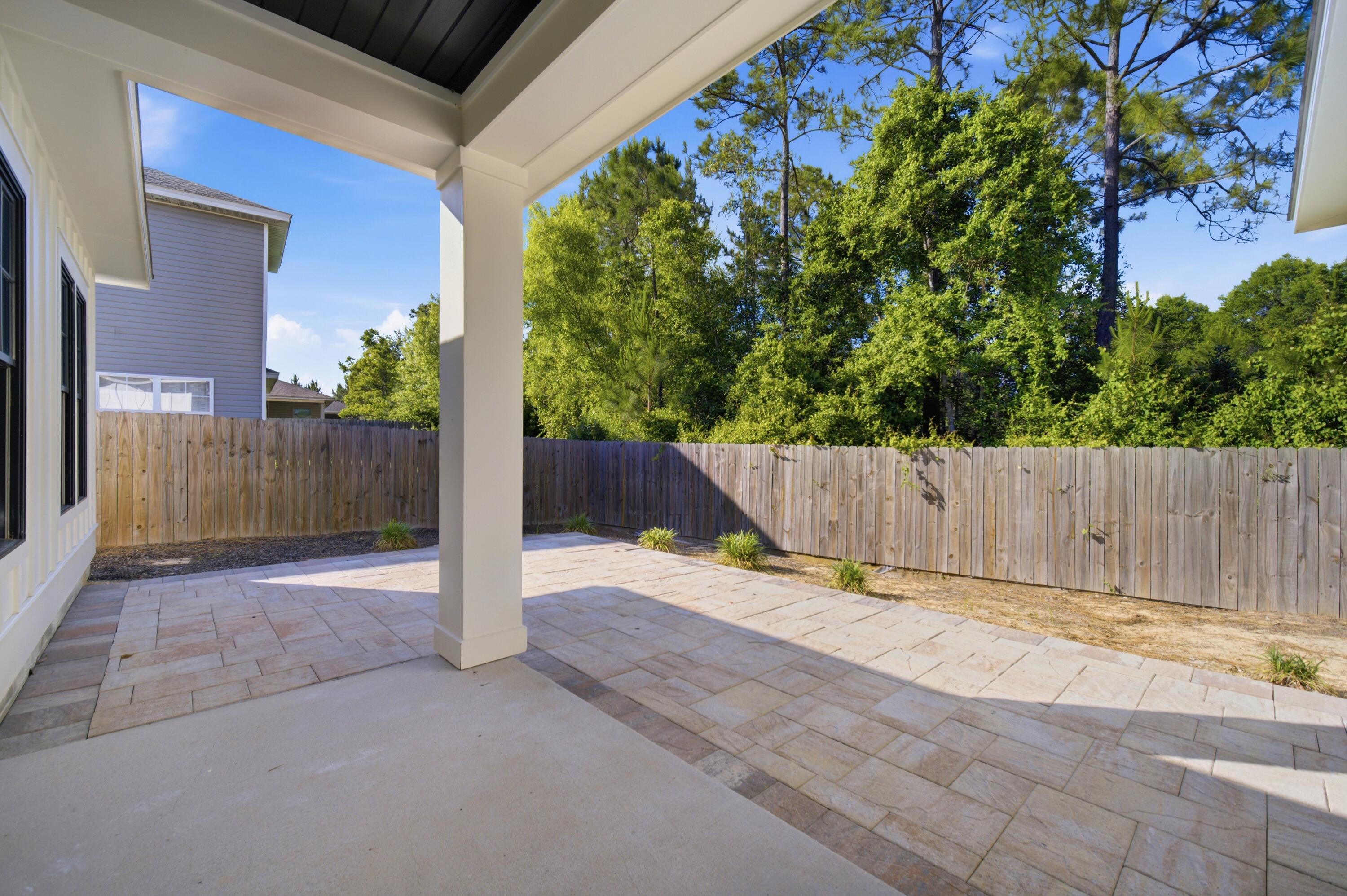 120 Lillian Way Crestview, FL 32536 - Photo 26 of 67 a view of backyard with small cabin
