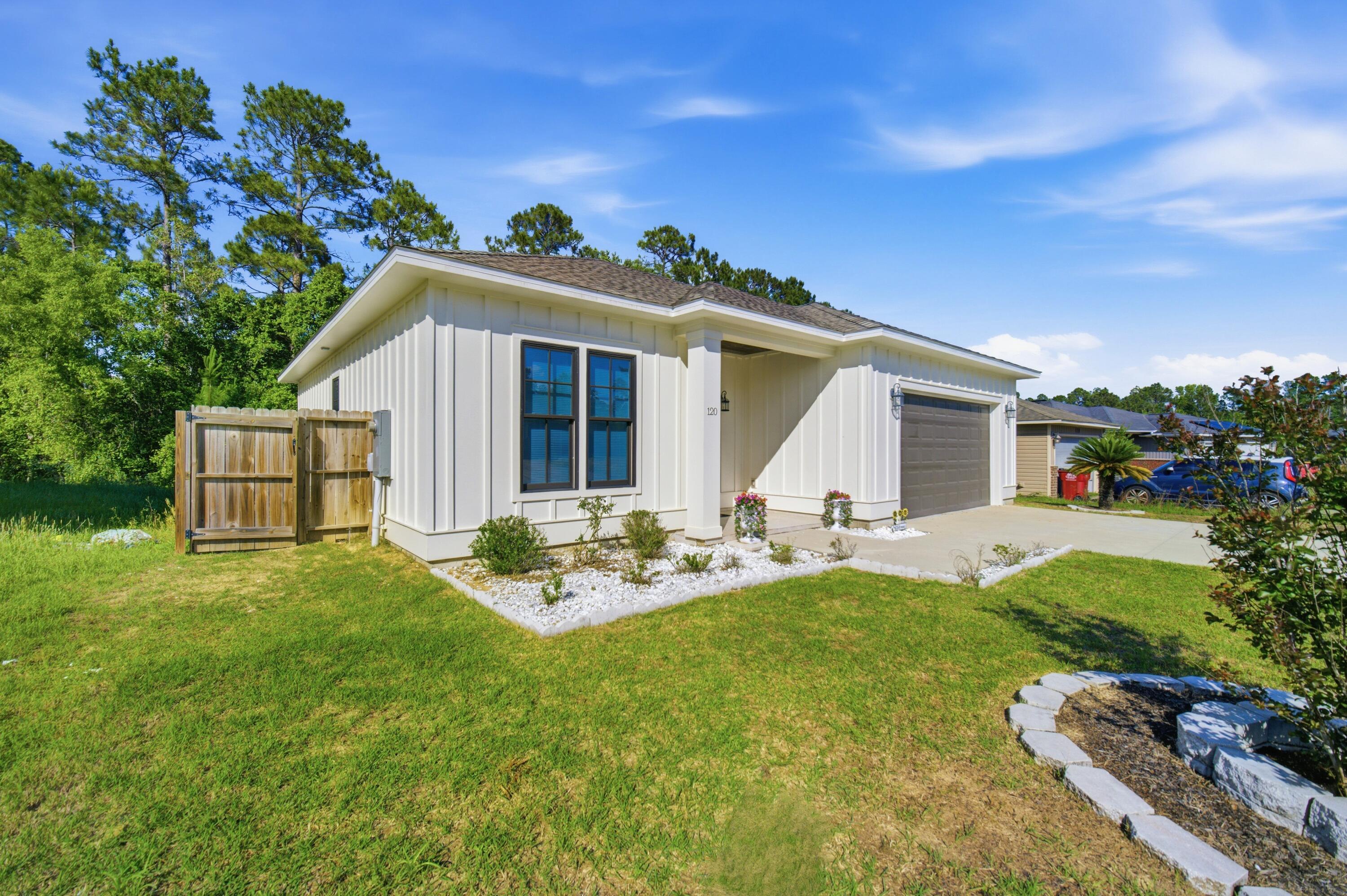 120 Lillian Way Crestview, FL 32536 - Photo 5 of 67 a view of a house with backyard and sitting area