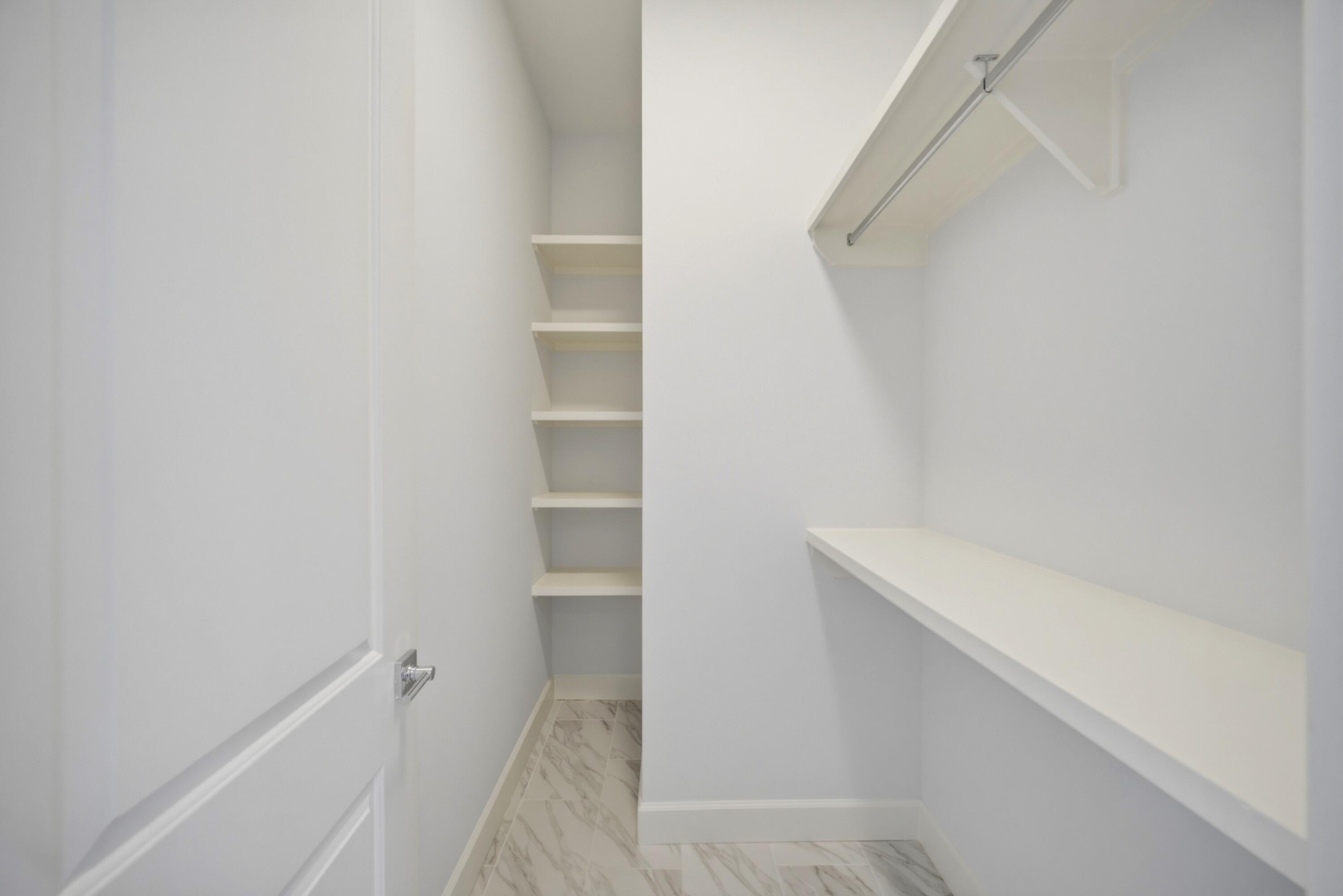 120 Lillian Way Crestview, FL 32536 - Photo 52 of 67 a view of walk in closet with empty racks