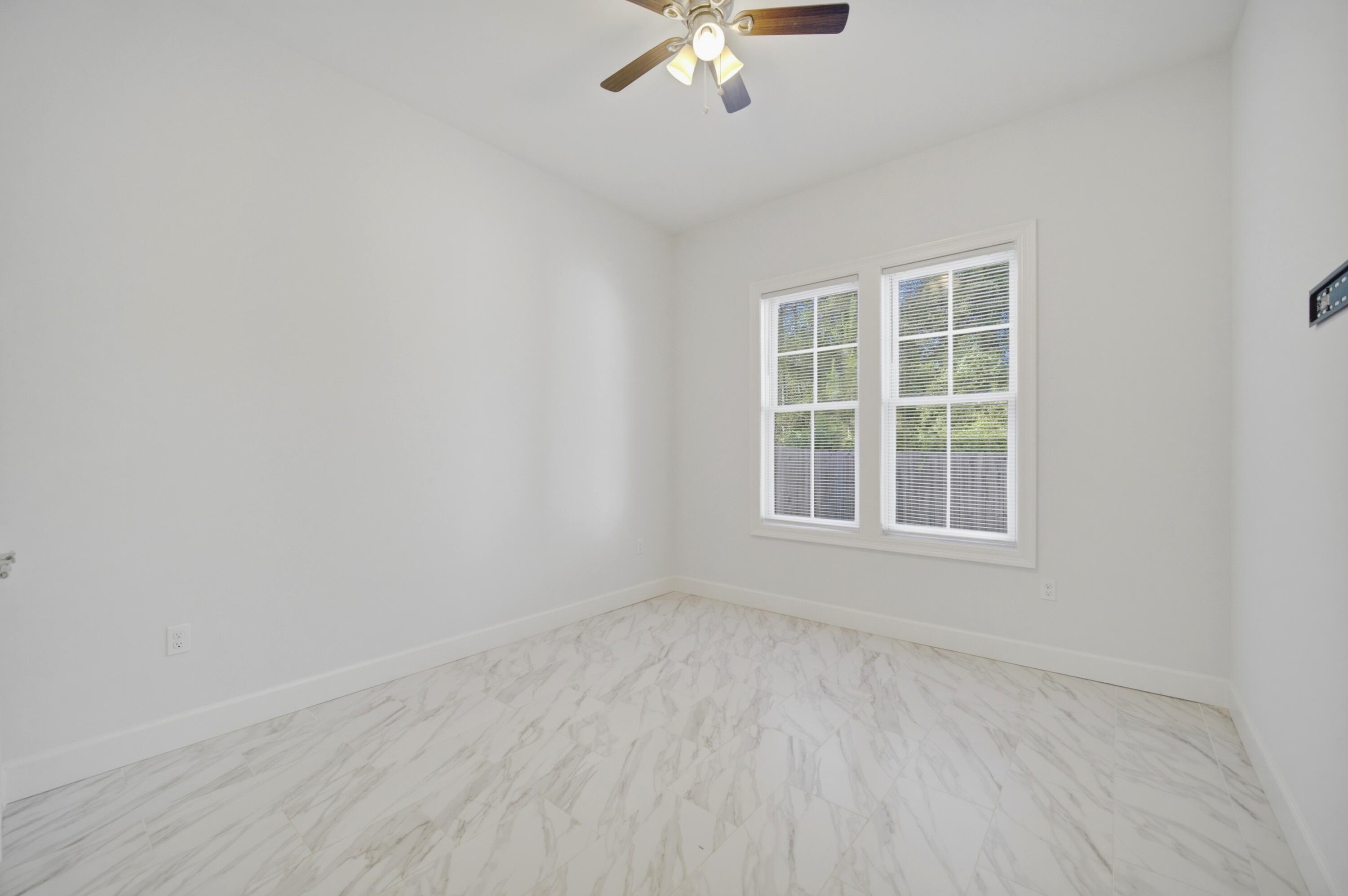 120 Lillian Way Crestview, FL 32536 - Photo 63 of 67 an empty room with a window