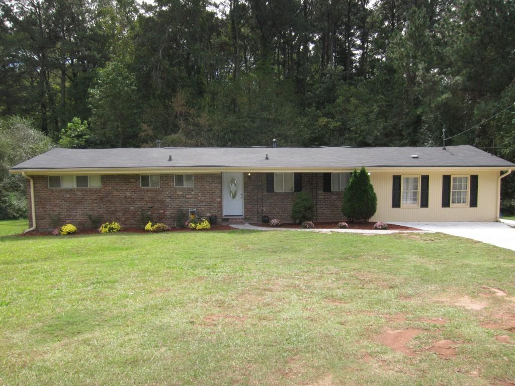 430 Kurtz Road Marietta, GA 30066 - Photo 1 of 1 Three sided brick home on a large lot with fenced back yard.
