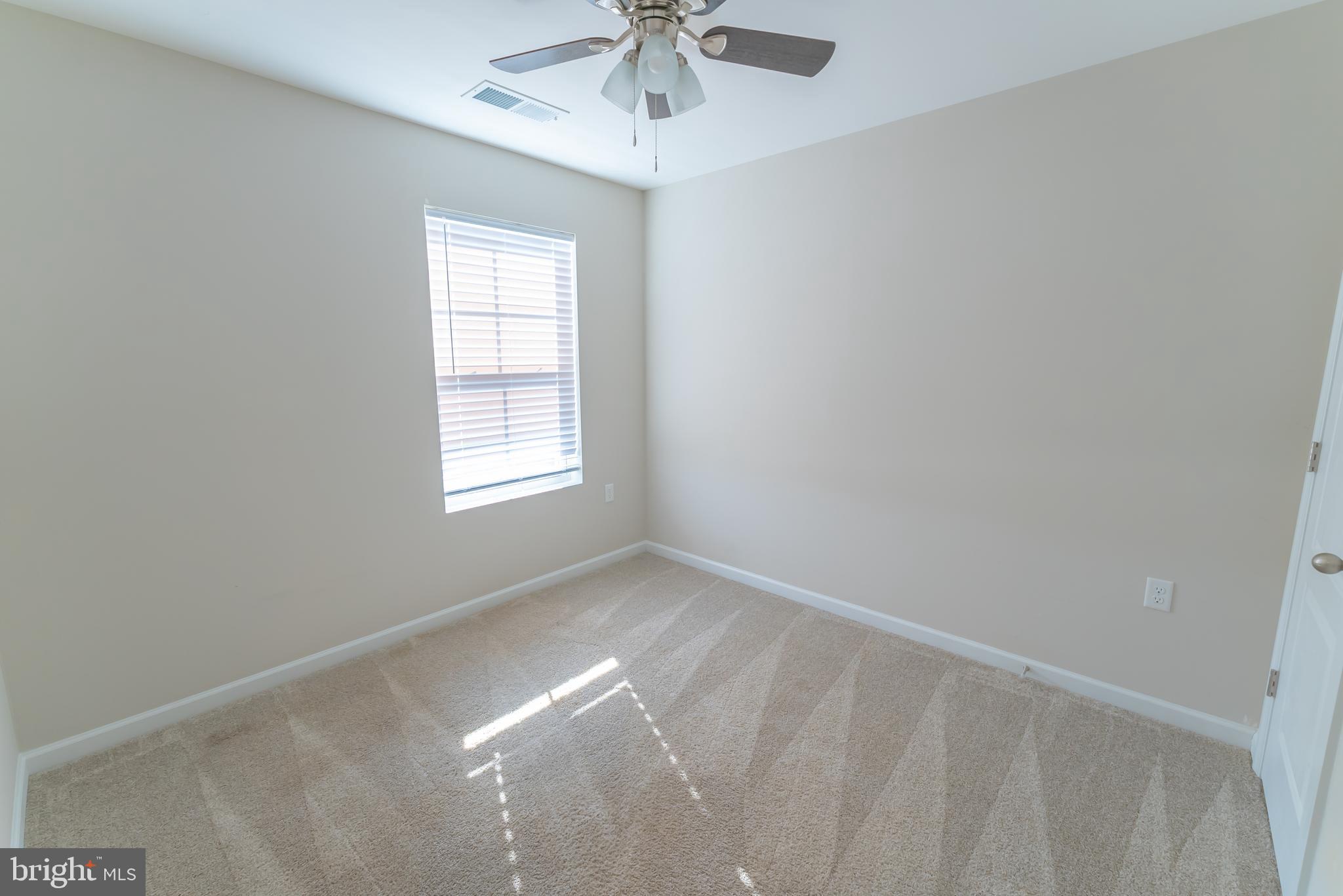 98 Eurasian Drive Bunker Hill, WV 25413 - Photo 18 of 28 3rd Bedroom