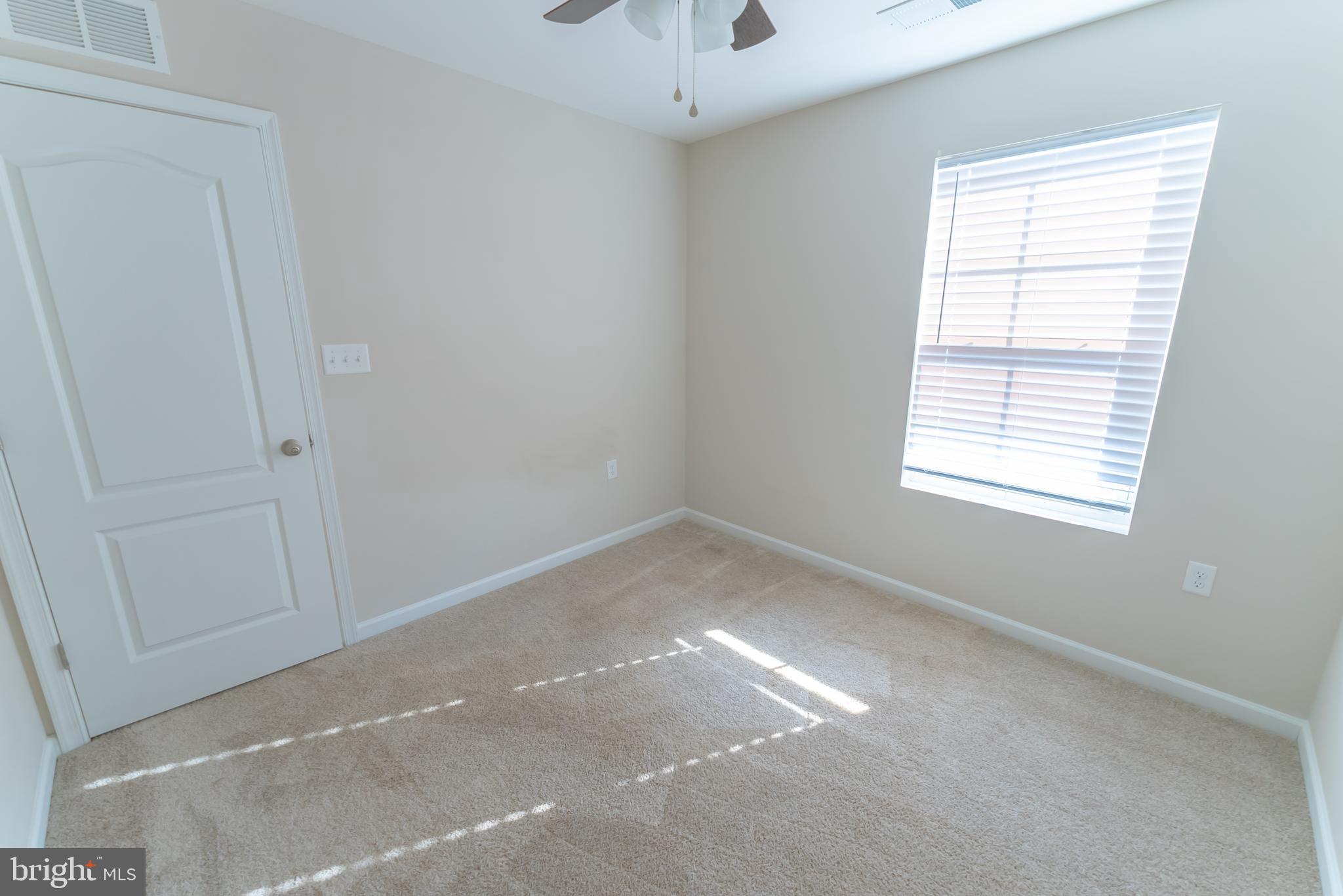 98 Eurasian Drive Bunker Hill, WV 25413 - Photo 19 of 28 3rd Bedroom