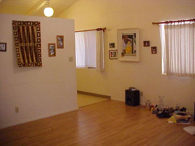 2103 Kokomo Road Haiku, HI 96708 - Photo 10 of 10 a view of a livingroom with furniture and windows