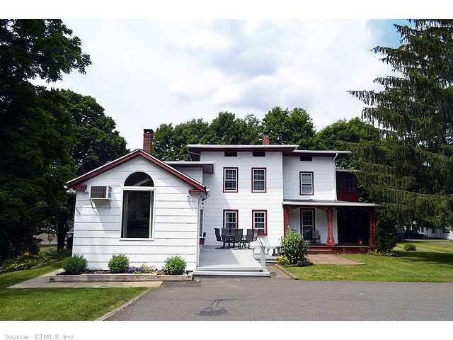 604 Mixville Road Cheshire, CT 06410 - Photo 1 of 1 a front view of a house with a garden