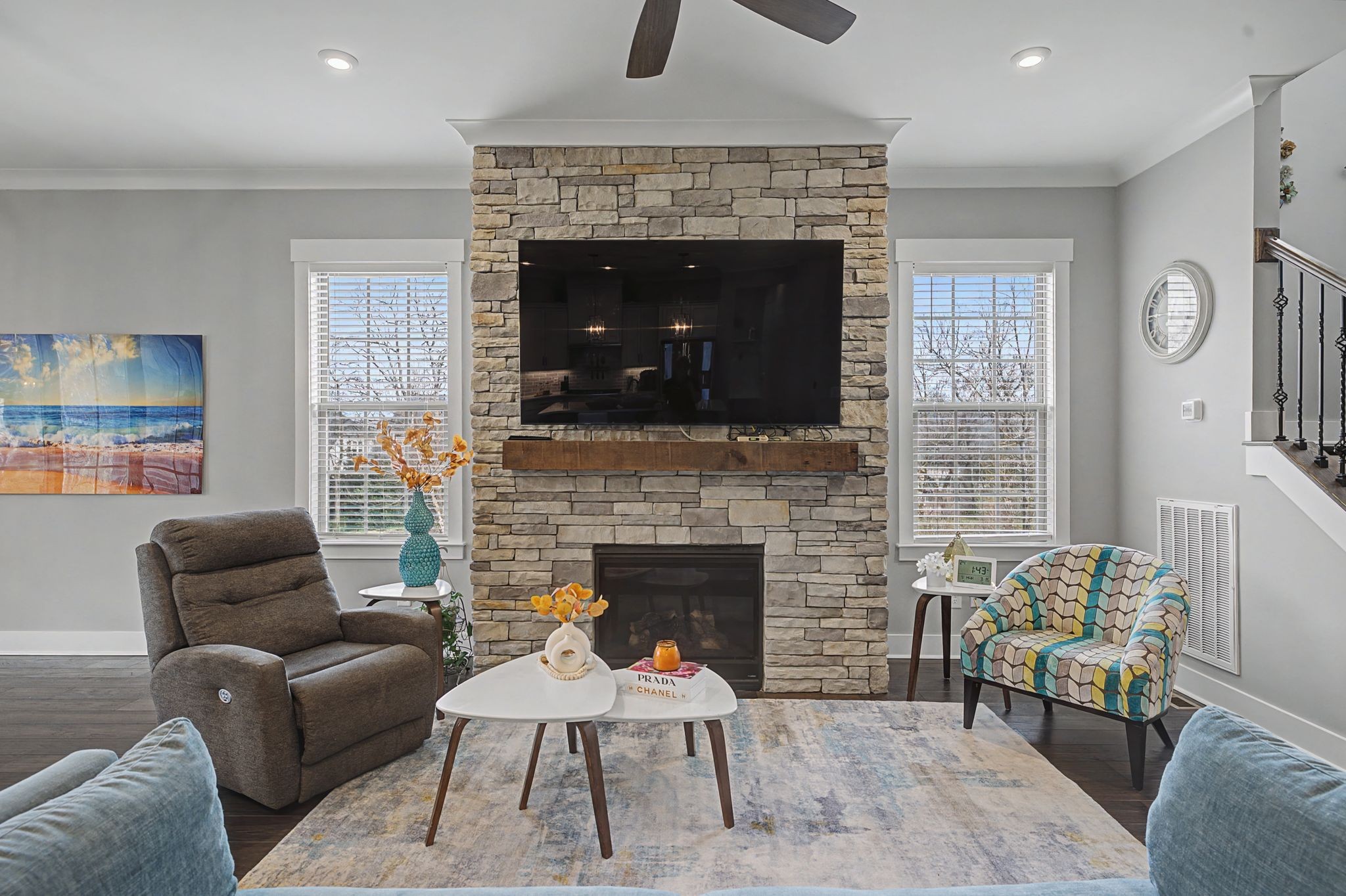 455 Cardel Lane Franklin, TN 37064 - Photo 15 of 54 a living room with furniture and a fireplace