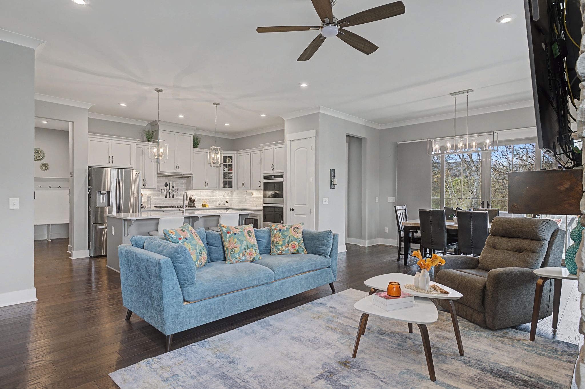 455 Cardel Lane Franklin, TN 37064 - Photo 16 of 54 a living room with furniture and kitchen view