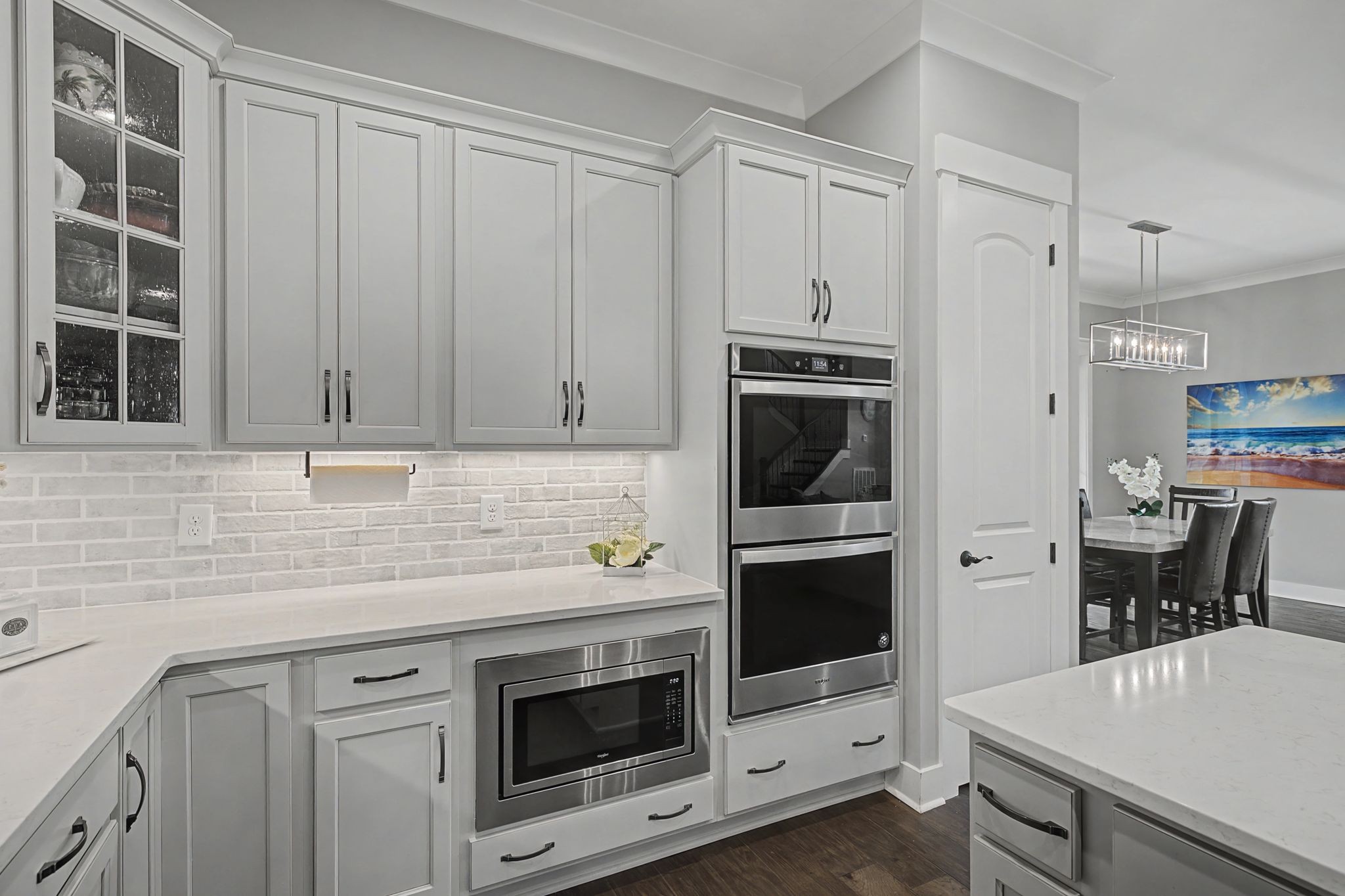 455 Cardel Lane Franklin, TN 37064 - Photo 21 of 54 a kitchen with a sink stove and microwave