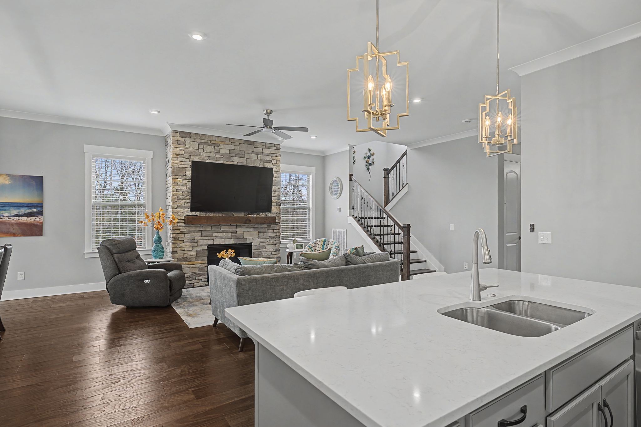 455 Cardel Lane Franklin, TN 37064 - Photo 22 of 54 a view of living room kitchen with furniture and wooden floor