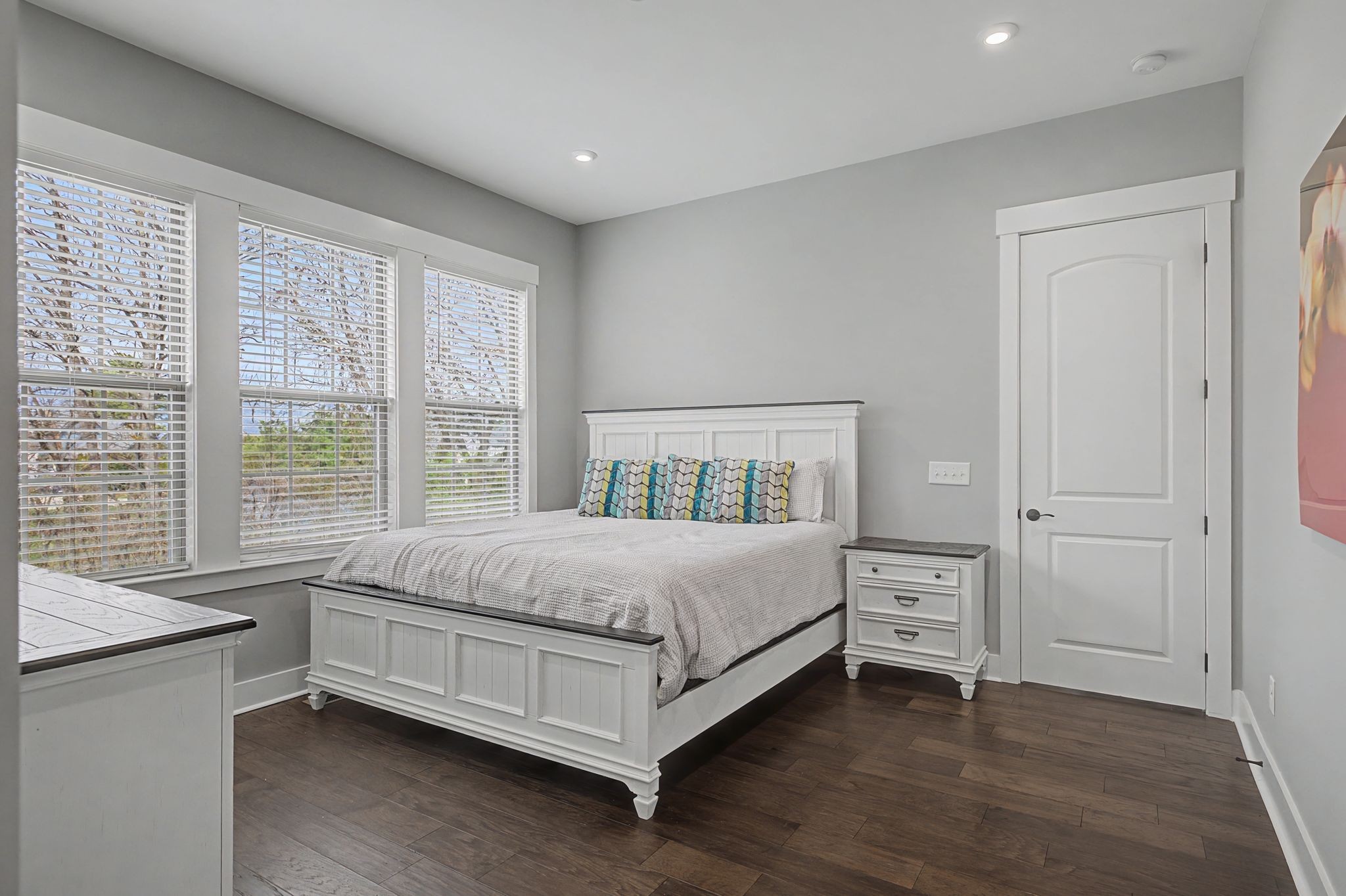 455 Cardel Lane Franklin, TN 37064 - Photo 25 of 54 a bed sitting in a spacious bedroom next to a window