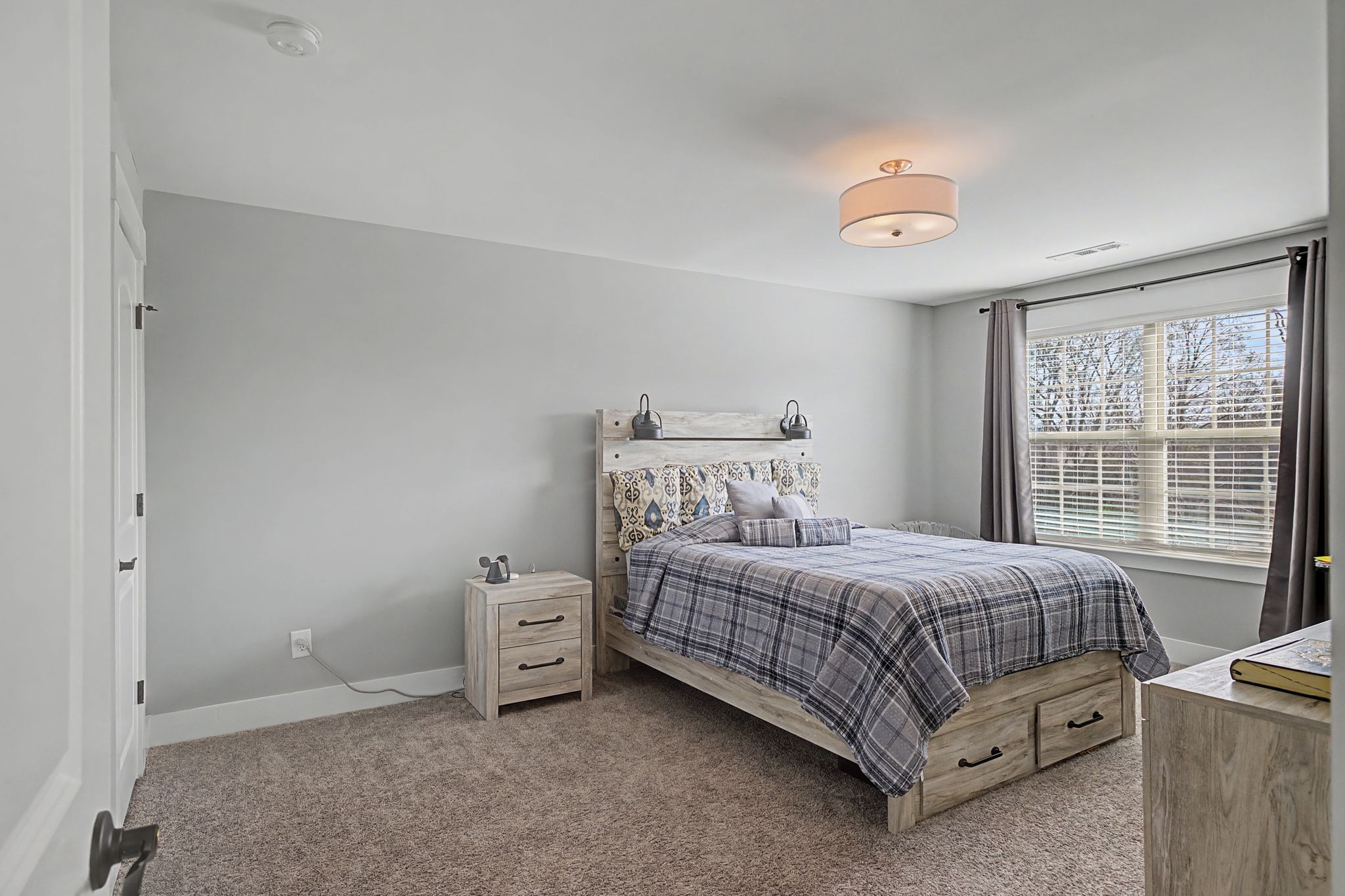 455 Cardel Lane Franklin, TN 37064 - Photo 33 of 54 a bedroom with a bed and a window