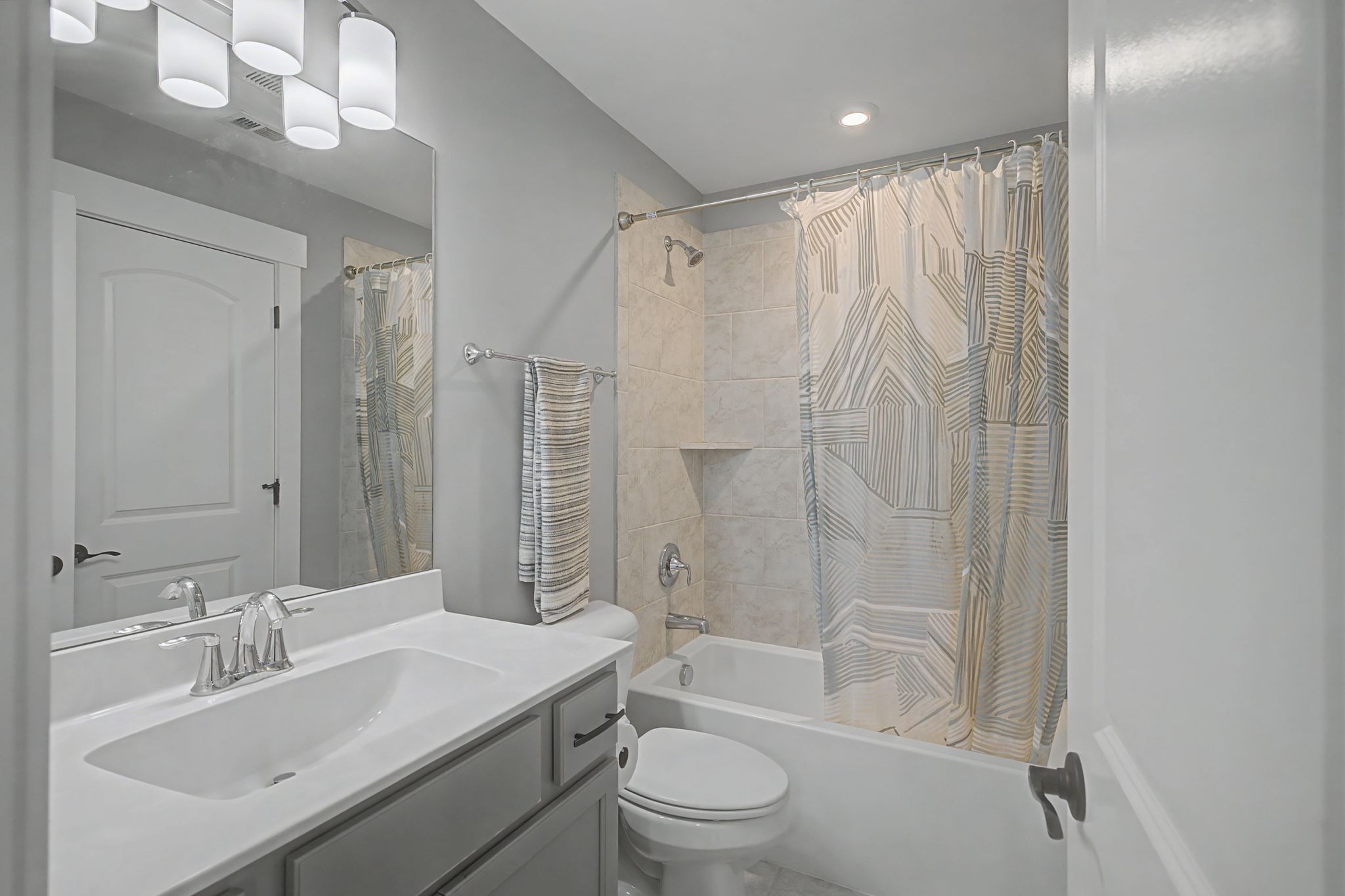455 Cardel Lane Franklin, TN 37064 - Photo 36 of 54 a bathroom with a sink a toilet and shower