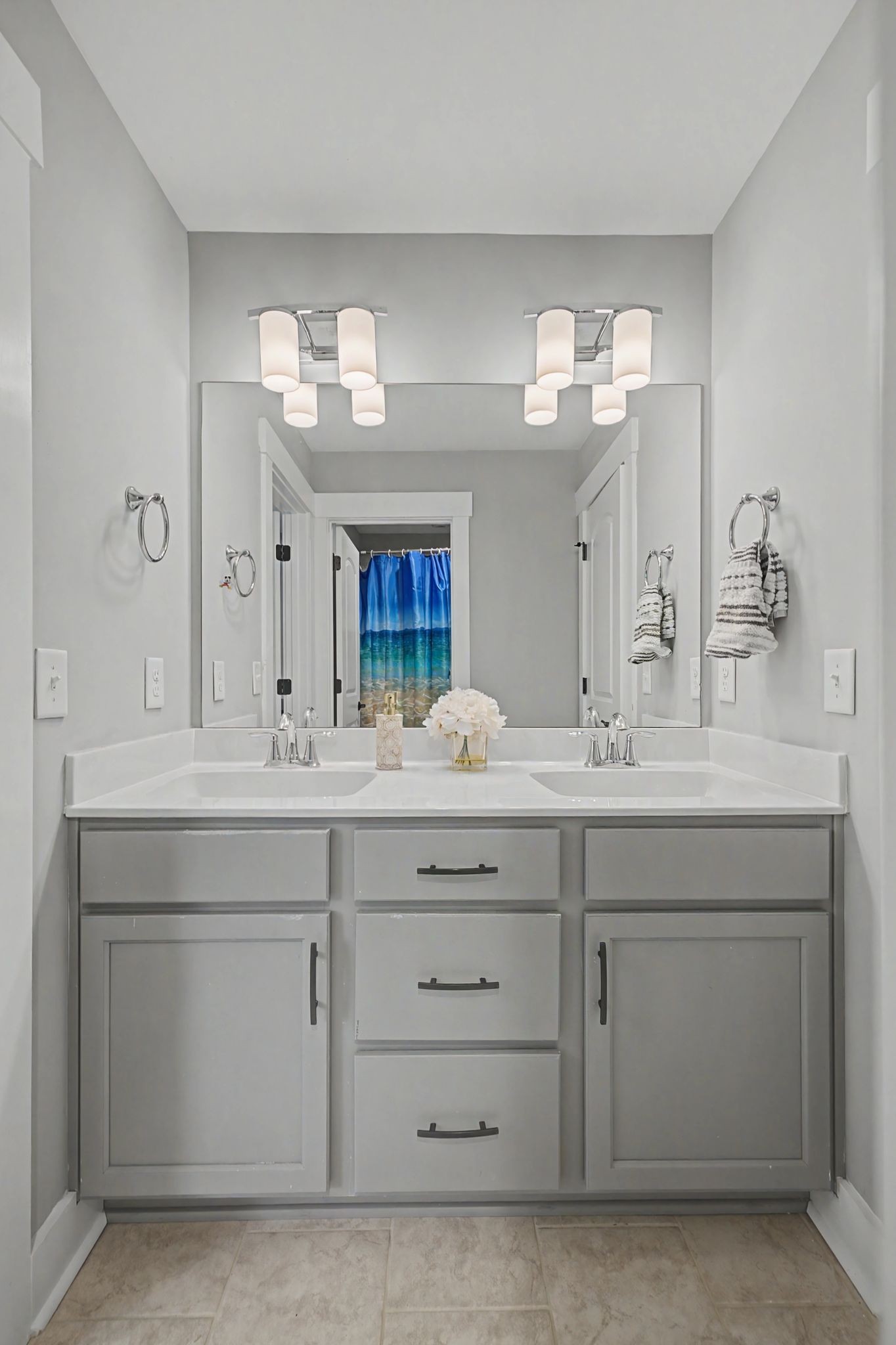 455 Cardel Lane Franklin, TN 37064 - Photo 39 of 54 a bathroom with a double vanity sink and a mirror