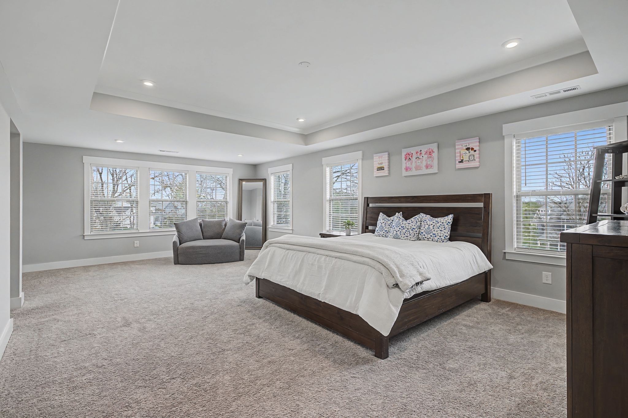455 Cardel Lane Franklin, TN 37064 - Photo 42 of 54 a spacious bedroom with a large bed and a couch