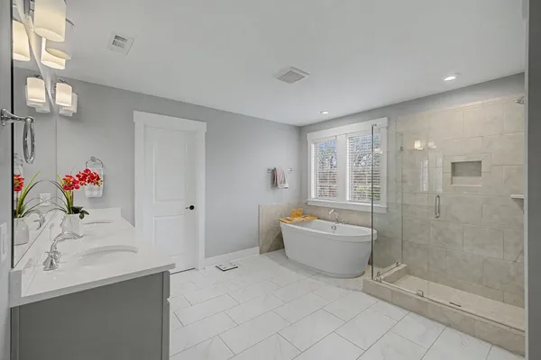a utility room with sink dryer and washer
