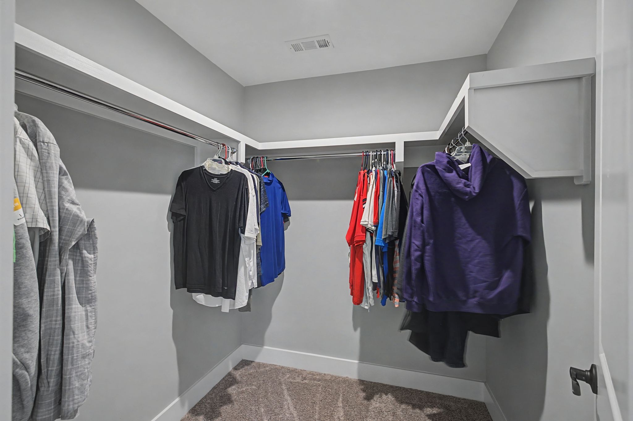 455 Cardel Lane Franklin, TN 37064 - Photo 48 of 54 a view of walk in closet with clothes and shoes