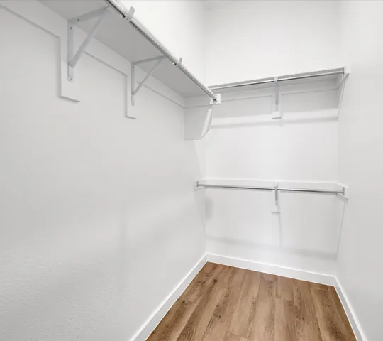 a view of a room with racks on the wall