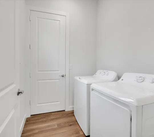 a utility room with dryer and washer