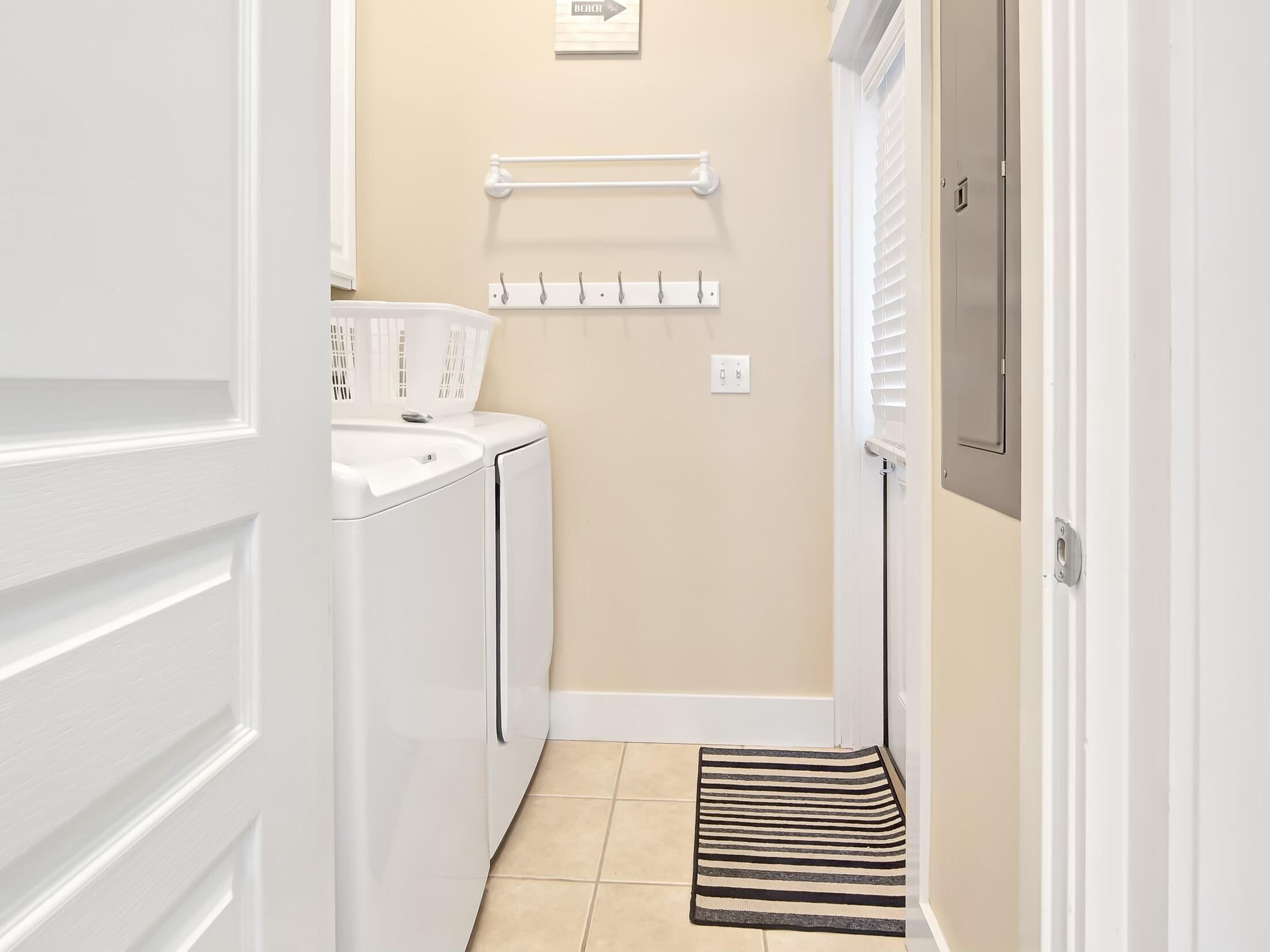 212 Seacrest Beach Boulevard East Inlet Beach, FL 32461 - Photo 12 of 39 a view of a hallway with washer and dryer
