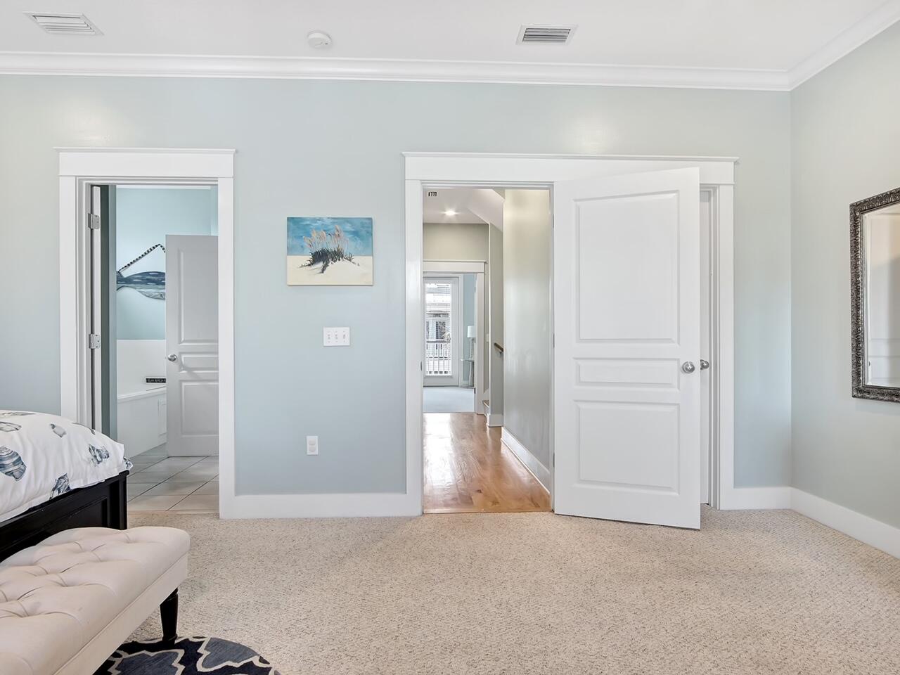 212 Seacrest Beach Boulevard East Inlet Beach, FL 32461 - Photo 17 of 39 wooden floor and bathroom with mirror