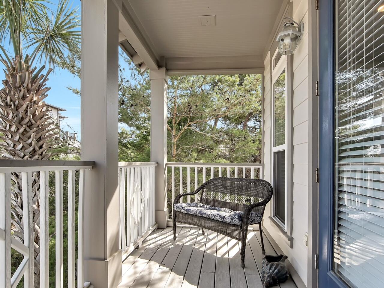 212 Seacrest Beach Boulevard East Inlet Beach, FL 32461 - Photo 20 of 39 a view of a balcony with furniture
