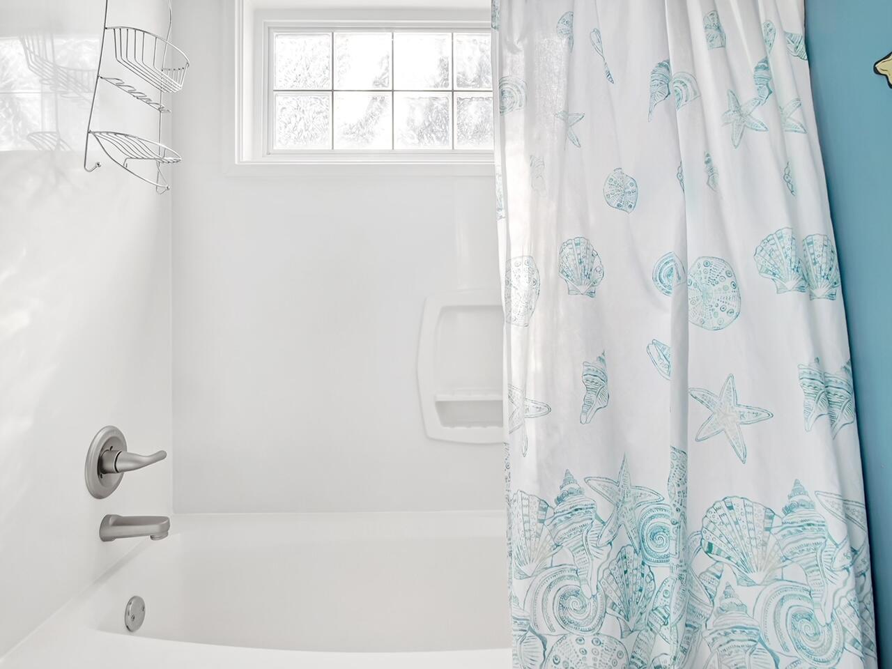 212 Seacrest Beach Boulevard East Inlet Beach, FL 32461 - Photo 27 of 39 a bathroom with a bathtub