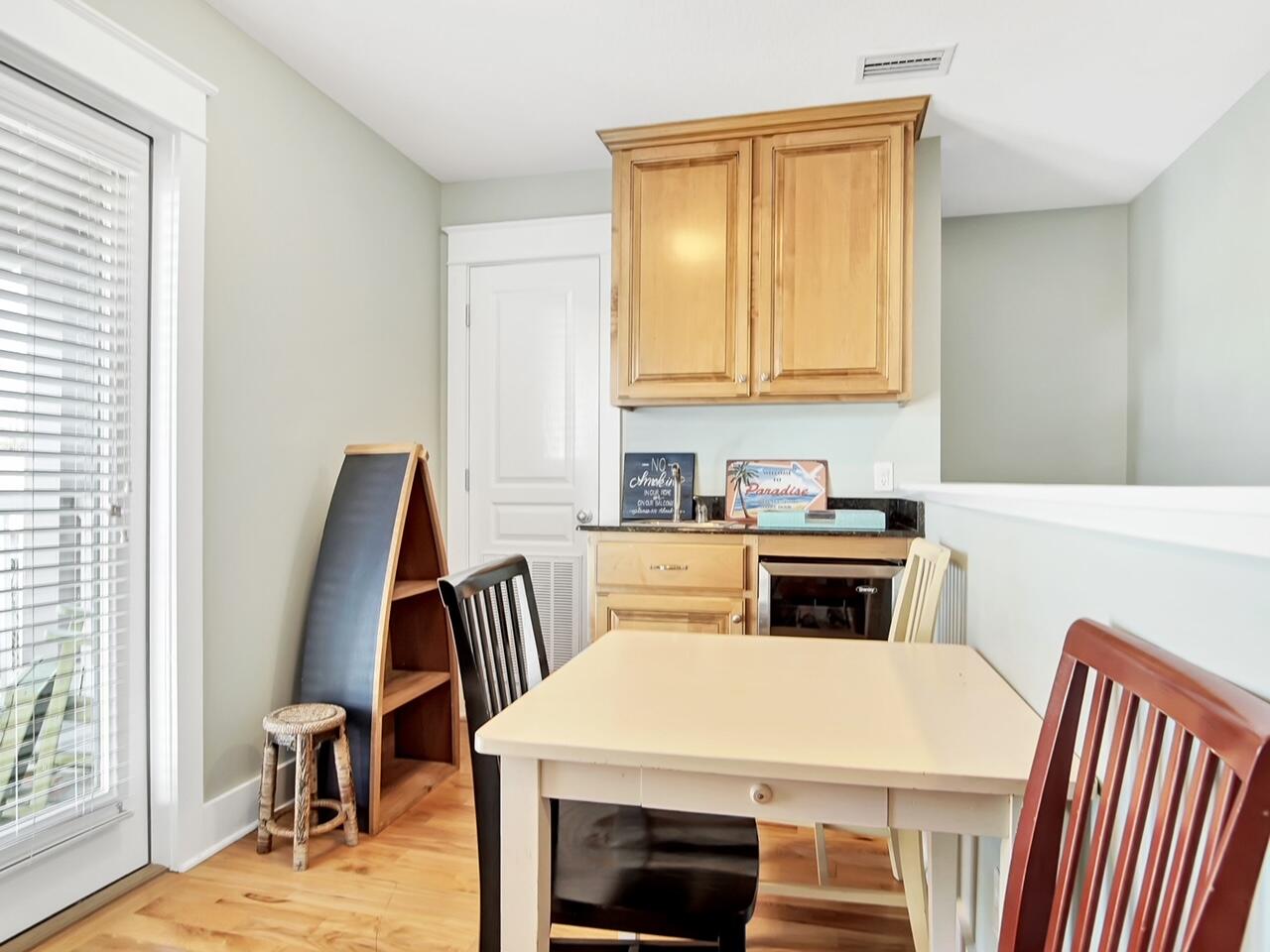212 Seacrest Beach Boulevard East Inlet Beach, FL 32461 - Photo 29 of 39 a kitchen with a stove a sink and a refrigerator
