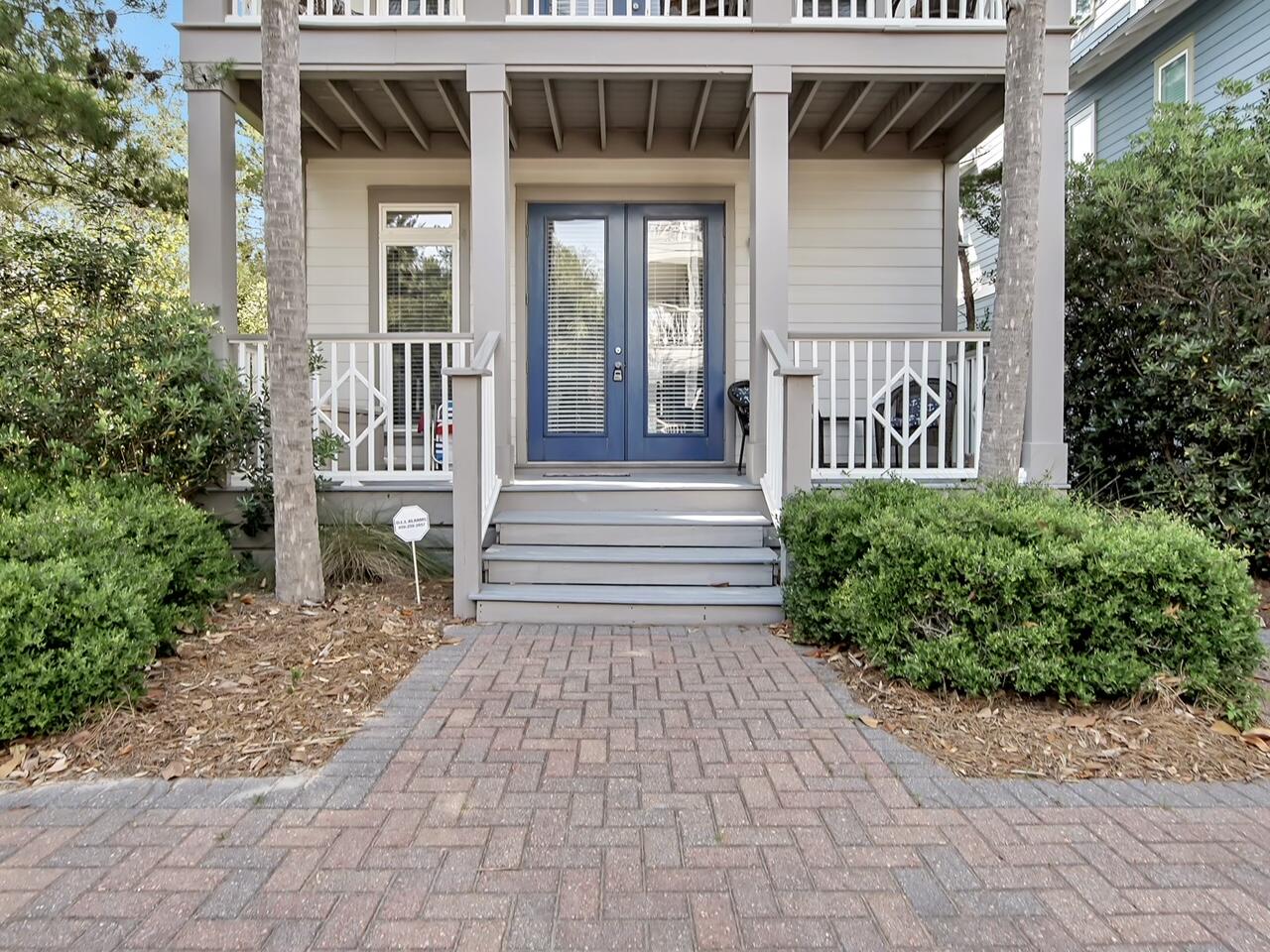 212 Seacrest Beach Boulevard East Inlet Beach, FL 32461 - Photo 32 of 39 a front view of a house with a porch