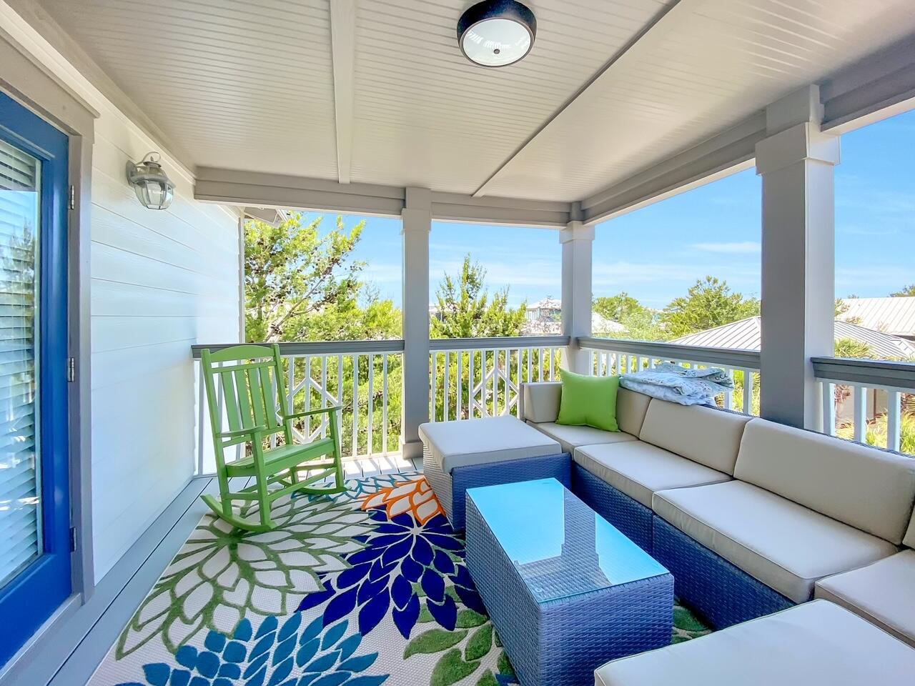 212 Seacrest Beach Boulevard East Inlet Beach, FL 32461 - Photo 33 of 39 a living room with furniture and a large window