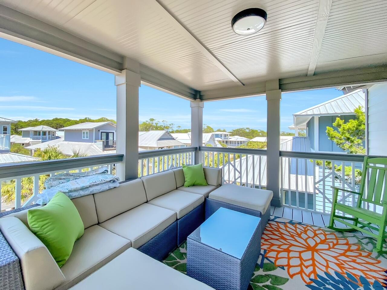 212 Seacrest Beach Boulevard East Inlet Beach, FL 32461 - Photo 35 of 39 a balcony with furniture