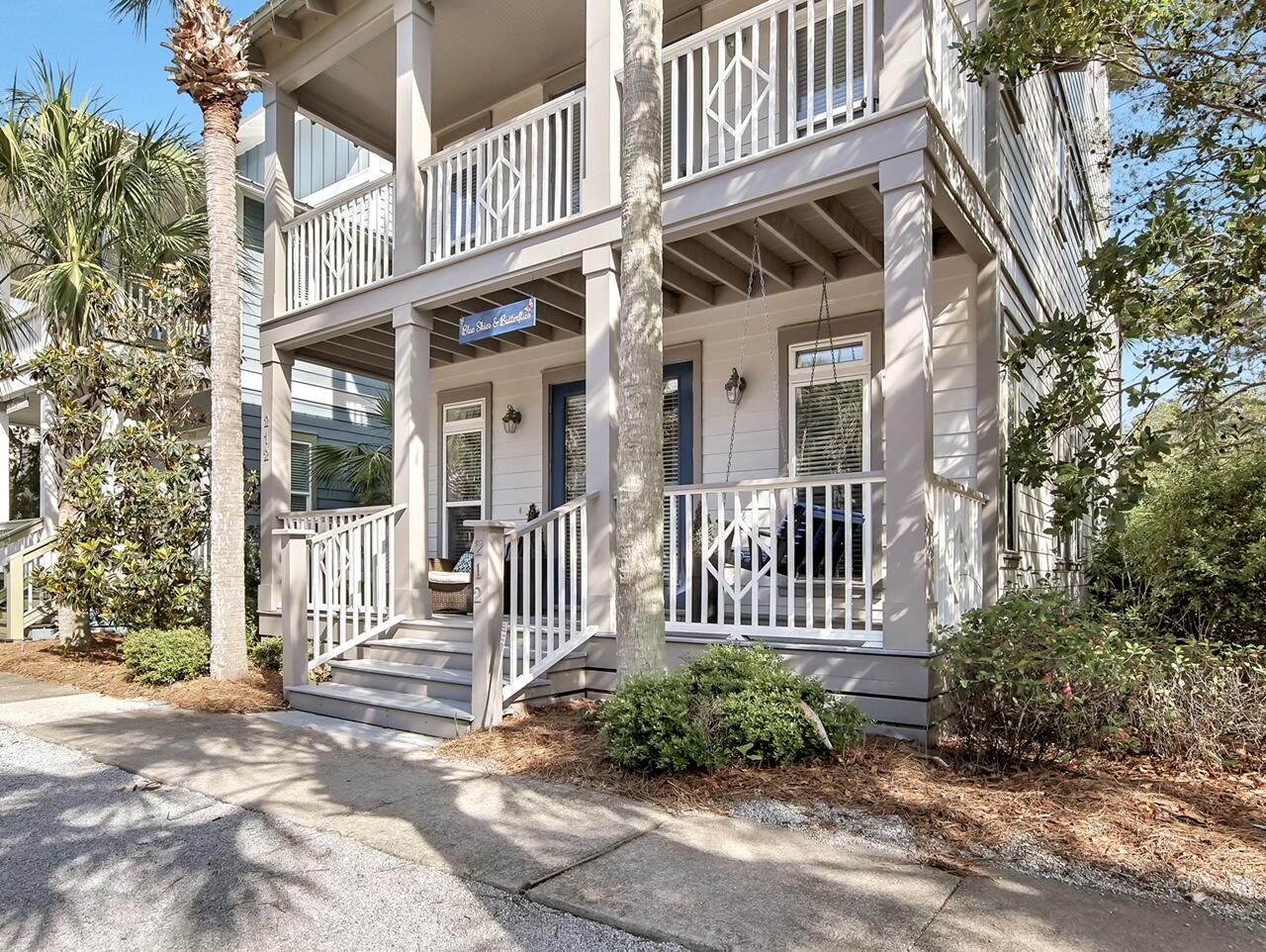 212 Seacrest Beach Boulevard East Inlet Beach, FL 32461 - Photo 4 of 39 a view of a house with a porch