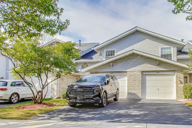 a car parked in front of a house