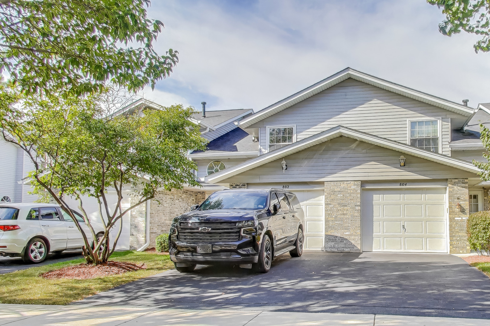 a car parked in front of a house