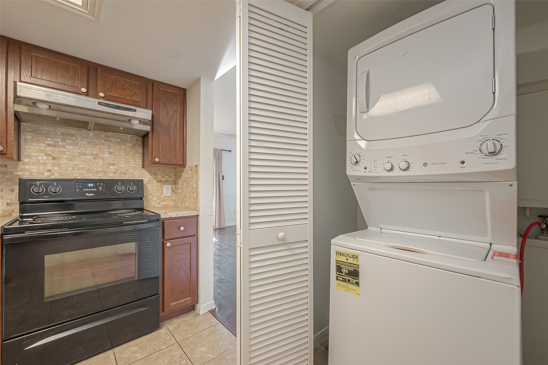 3758 Tanglewilde Street, Unit 2 Houston, TX 77063 - Photo 15 of 28 a close up view of a washer and dryer