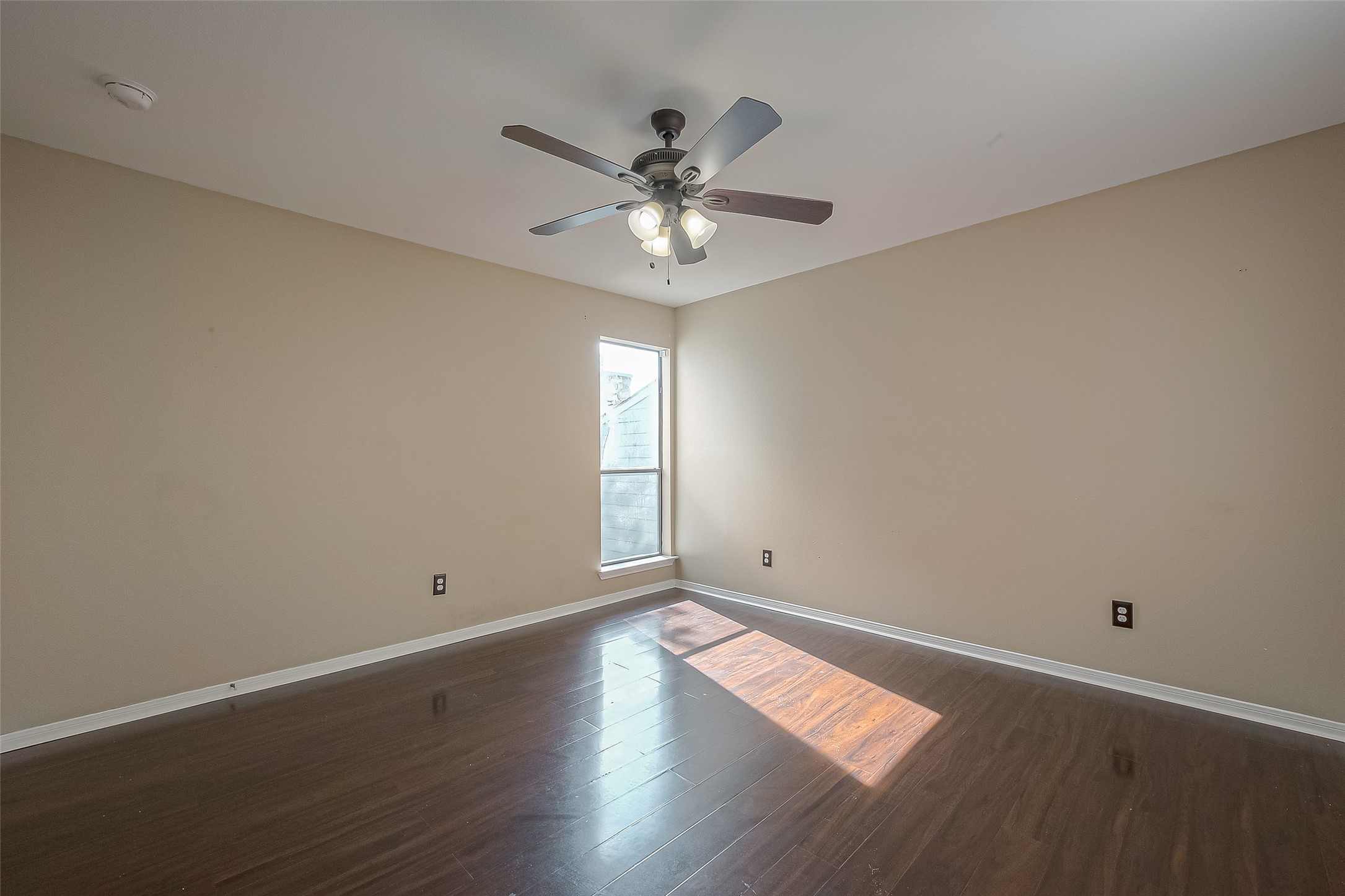 3758 Tanglewilde Street, Unit 2 Houston, TX 77063 - Photo 17 of 28 a view of wooden floor and windows in a room