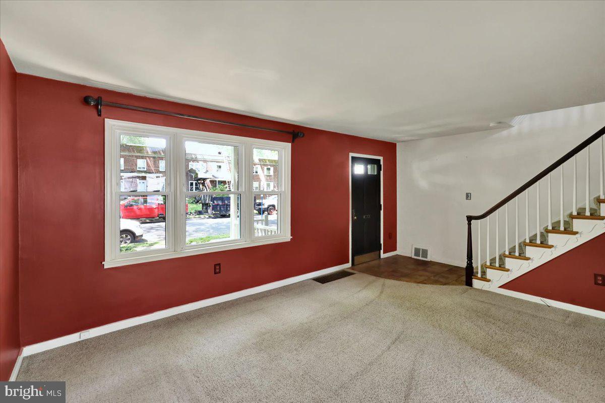 309 Sycamore Road Reading, PA 19611 - Photo 3 of 18 Hardwood floors under carpet throughout the home