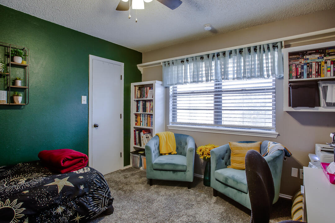 5304 89th Street Lubbock, TX 79424 - Photo 16 of 21 a bedroom with a bed and a window