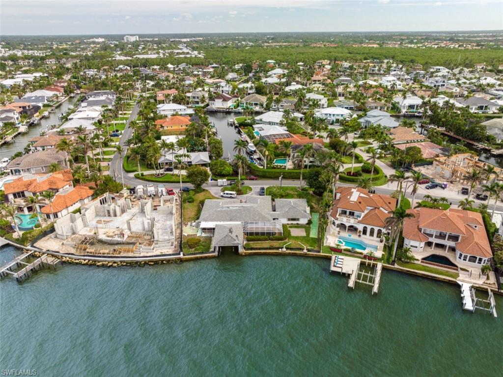 1910 Kingfish Road Naples, FL 34102 - Photo 9 of 11 a view of a city with lawn chairs