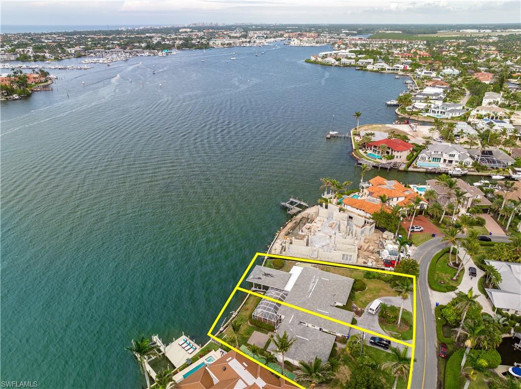 1910 Kingfish Road Naples, FL 34102 - Photo 10 of 11 an aerial view of a house with a ocean view