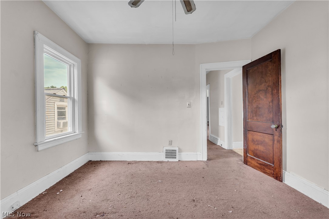 3713 Menlo Road Cleveland, OH 44120 - Photo 24 of 26 Carpeted empty room featuring ceiling fan