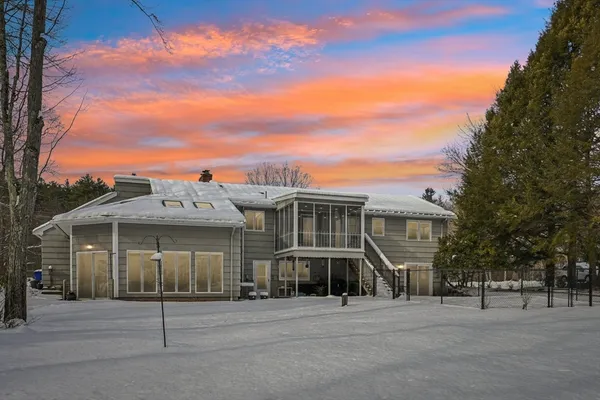 a front view of residential houses with street